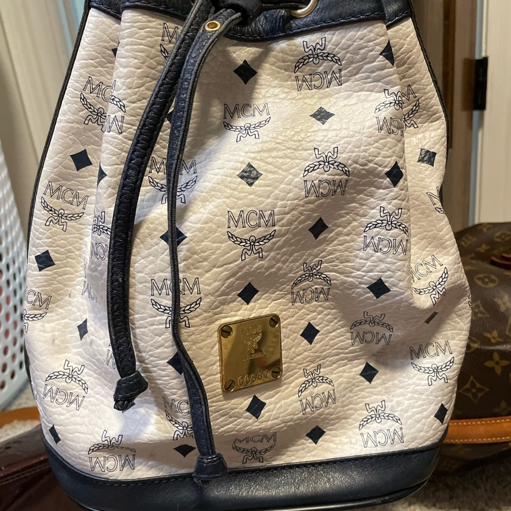 MCM Bucket Bag. Serial number on front. Black and white.